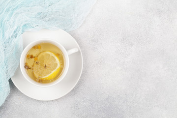 herbal chamomile tea on blue background