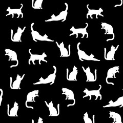 Black and white cat pattern on black background. Seamless pattern of via acting of the cats. Graphic design for decorating, wallpaper, fabric and etc.