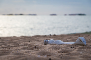A lonely bottle on the beach