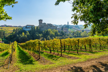 Levizzano Rangone and its vineyars in fall season. Province of Modena, Emilia Romagna, Italy.