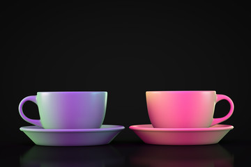 Two colored tea mugs on a dark background. With copyspace