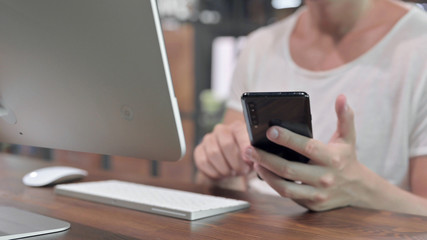 Close Up Shoot of Guy Hands Scrolling Smartphone on Desk