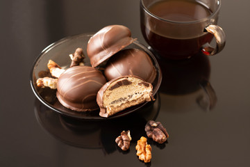 dark marshmallows with pieces of nuts