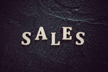 Sale Text On Black Background. Concept of sales