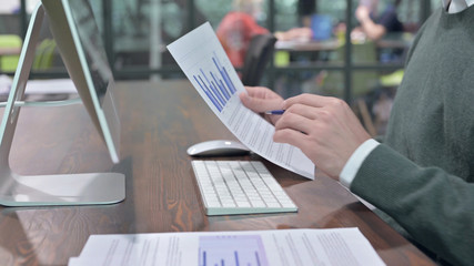 Close Up Shoot of Man Busy with Office Paperwork