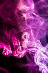 Colored smoke on black background