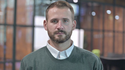 Portrait Shoot of Handsome Man looking at Camera