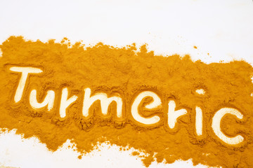Turmeric powder isolated on a white background is an ingredient in turmeric foods and ingredients in skin care products. Turmeric helps the skin to be strong.