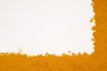 Turmeric powder isolated on a white background is an ingredient in turmeric foods and ingredients in skin care products. Turmeric helps the skin to be strong.