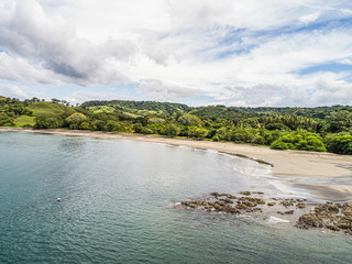 Aerial shot of the tropical beach Playa Arenillas in Costa Rica in peninsula Papagayo coast in guanacaste