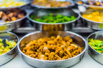 Traditional Asian food ingredients and dishes sold in a singapore restaurant