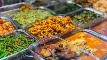 Traditional Asian food ingredients and dishes sold in a singapore restaurant