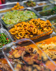 Traditional Asian food ingredients and dishes sold in a singapore restaurant