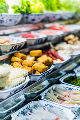 Traditional Asian food ingredients and dishes sold in a singapore restaurant