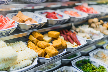 Traditional Asian food ingredients and dishes sold in a singapore restaurant