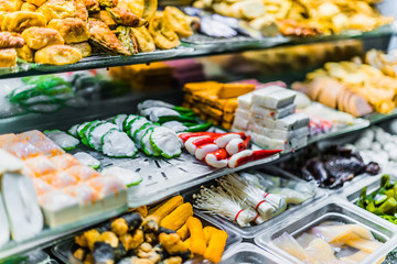 Traditional Asian food ingredients and dishes sold in a singapore restaurant
