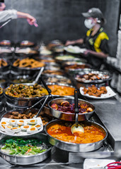 Traditional Asian food ingredients and dishes sold in a singapore restaurant