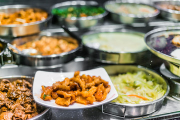 Traditional Asian food ingredients and dishes sold in a singapore restaurant