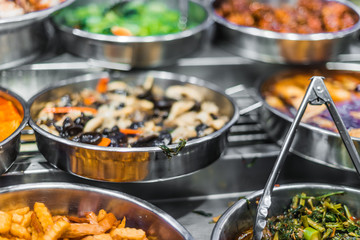 Traditional Asian food ingredients and dishes sold in a singapore restaurant