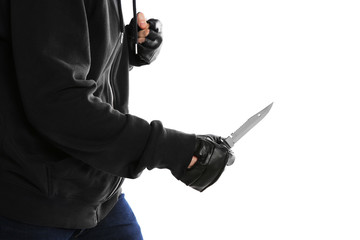 Man with knife on white background, closeup. Dangerous criminal