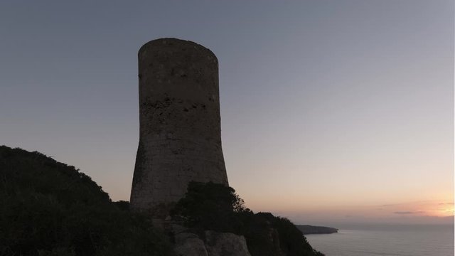 dawn watchtower of cap blanc, along lighthouse of cap blanc, majorca, balearic islands, spain