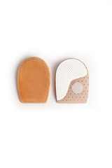 Orthopedic silicone heel from corns for the correction of different lengths of legs isolated on white background