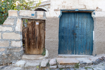 Old blue and brown wooden doors