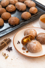traditional Russian honey cake or gingerbread called pryanik. Spice cake with fruit jam and honey filling authentic Russian dessert. Homemade sweet pastries on a baking sheet