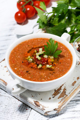 cold tomato soup in a bowl, vertical