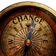 Vintage brass compass isolated on white background