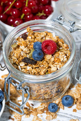 healthy banana muesli and breakfast ingredients, vertical closeup