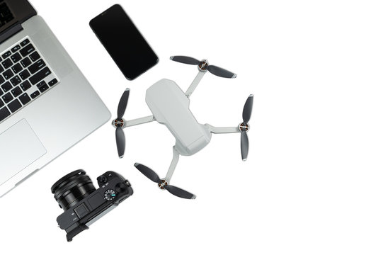 Travel gadgets equipments, including digital camera, drone, smartphone and laptop computer