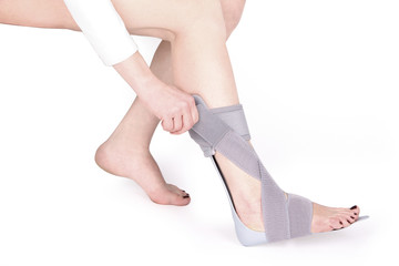 Orthopedic Ankle Brace. Medical Ankle Bandage. Medical Ankle Support Strap Adjustable Wrap Bandage Brace foot Pain Relief Sport. Leg Brace isolated on white background
