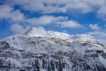 Scenic snow covered mountains in the alps of St. Anton am Arlberg, Austria. Large avalanche protection fences -Image