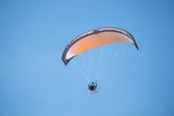 Paragliders flying