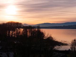 Obraz premium Beautiful view of the Lake Murten or Lake Morat in Switzerland at sunset. 