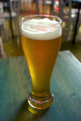 glass of beer on table