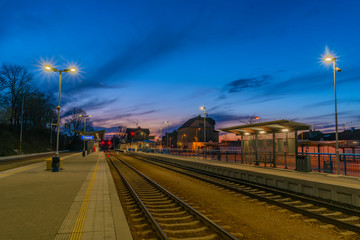 Fototapeta na wymiar Color blue sky evening after nice sunset in Trebic station in winter