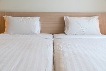 Fototapeta na wymiar White pillow on bed.