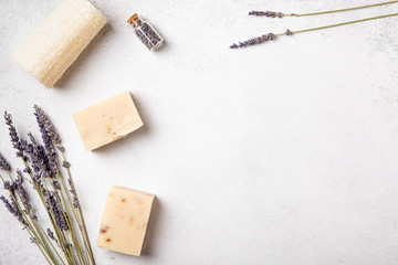 Flat lay of self-care routines on neutral tones background. Natural cosmetic products with lavender...