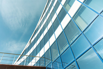 Fototapeta na wymiar Facade of an office building rising to the sky.