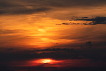 Fototapeta na wymiar Beautiful colorful bright sunset sky with orange clouds. Nature sky background. 