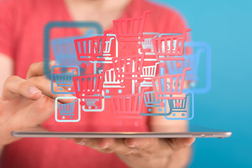 Shopping cart on digital tablet. Shopping online concept..
