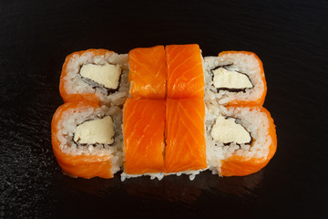 Japanese food: Set of salmon sushi and rolls with salmon and eel