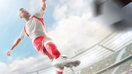 Soccer player in action. Plays on a professional stadium. Sport action. Close ups. The stadium in 3D