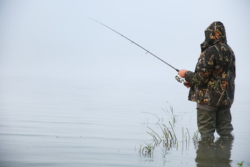 background of fisherman in the fog with copy space