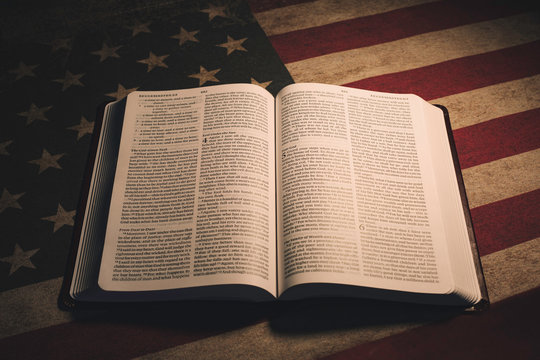 Holy Bible on a vintage American Flag
