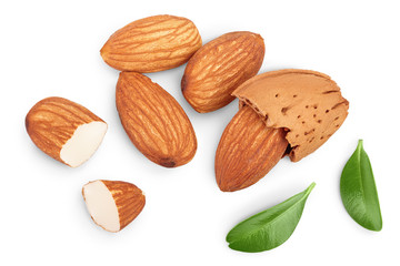Almonds nuts with leaves isolated on white background with clipping path and full depth of field. Top view. Flat lay.