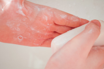 Fototapeta premium washing hands with soap