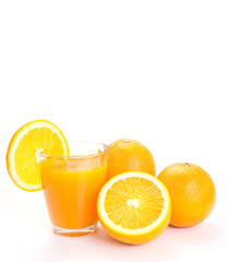 Glass of orange juice on white background
